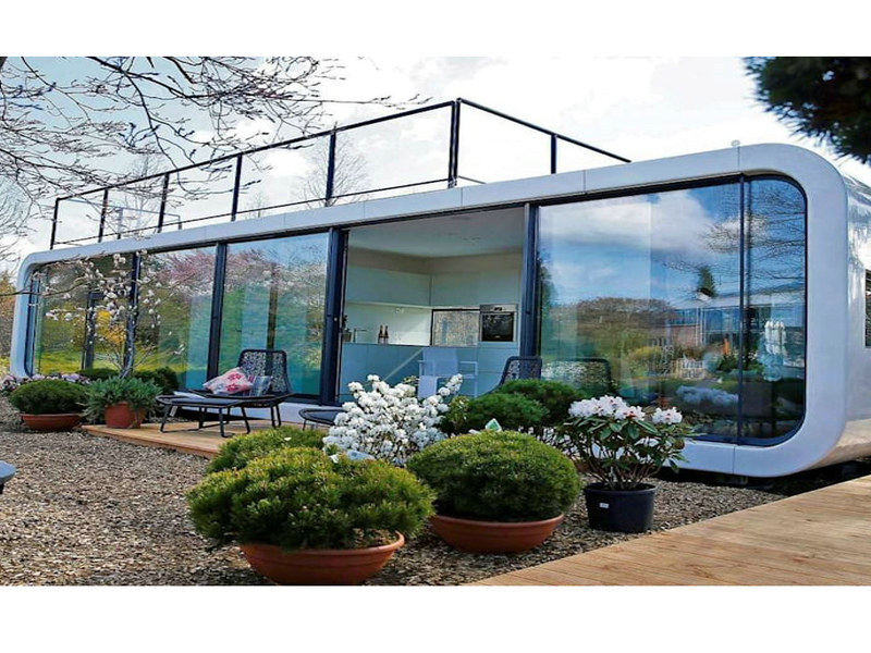 Revolutionary glass prefab house selections with multiple bathrooms