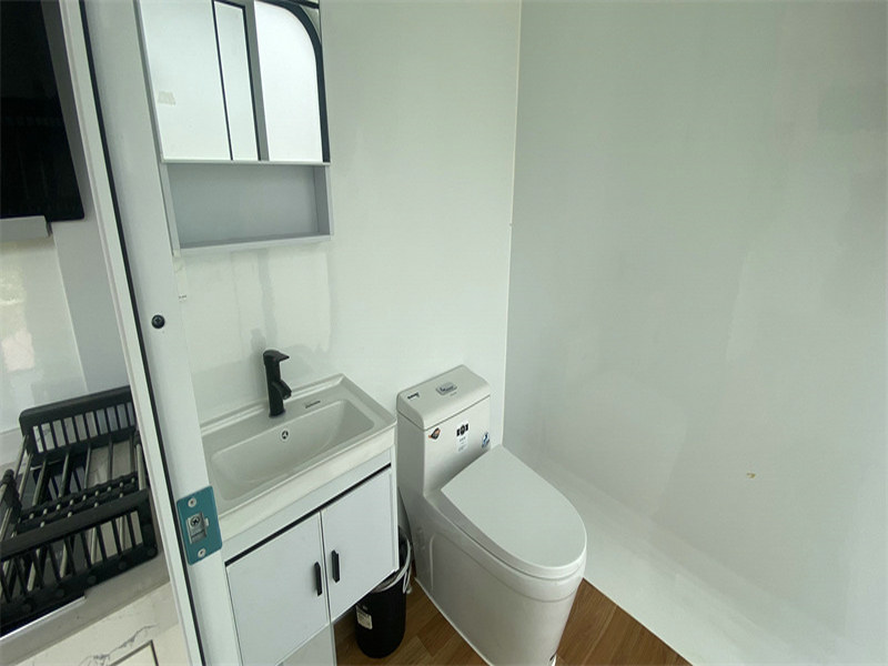 Convertible galvanized steel bathroom with loft space